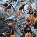 Buscan a 20 desaparecidos tras derrumbe de edificio en Filipinas